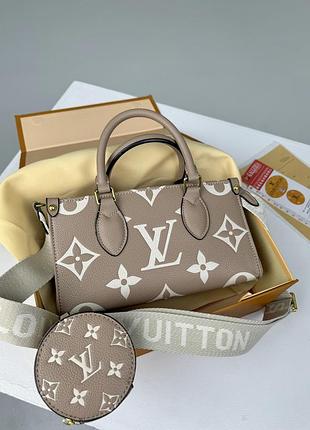 Сумка louis vuitton monogram reverse onthego бежевий луї віттон