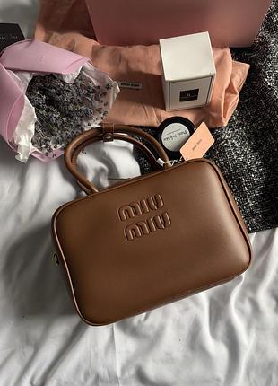 Miu mu leather top handle bag brown