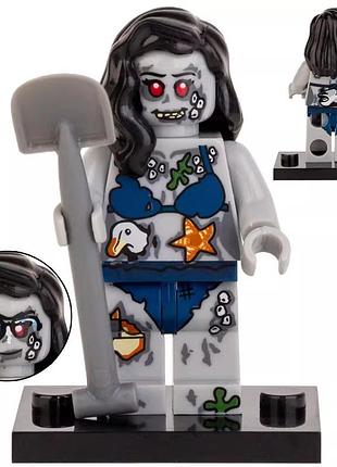 Фигурка зомби девушка zombie girl с лопатой для lego лего