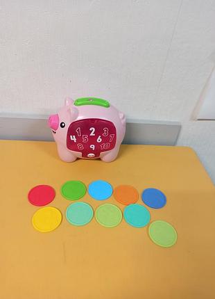 Розвиваюча іграшка інтерактивна "свинка скарбничка" від fisher-price