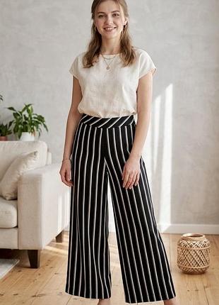 Жіночі брюки, штани чорні в полску , палаццо h&m , розмір 34