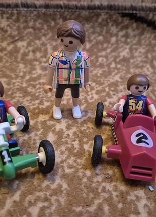 Дети на гонках playmobil гонщики