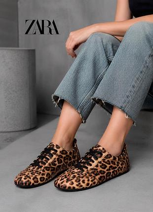 Нові текстильні легенькі оригінальні кросівки у лео принт zara 36