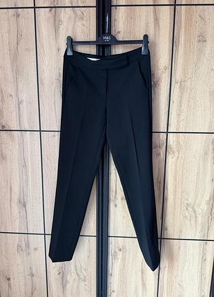 Брюки від бренду max mara