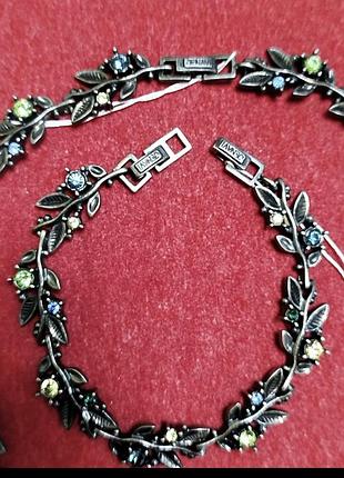 Елітна біжутерія jenavi кольє та браслет з різнокольоровими кристалами swarovski
