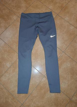 Сірі спортивні легінси nike dri-fit