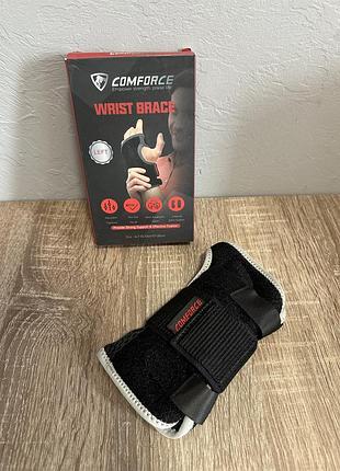 Ортопедический бандаж comforce для левого запястья и большого пальца.