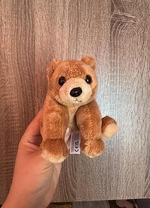 Ця м'яка іграшка — wild republic pocketkins eco grizzly bear, виготовлена з екологічно чистих матеріалів.