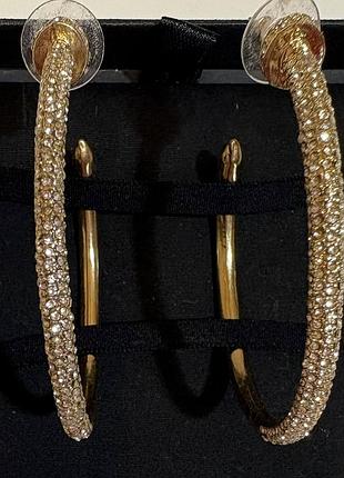 Серьги серьги кольца со стразами золотые