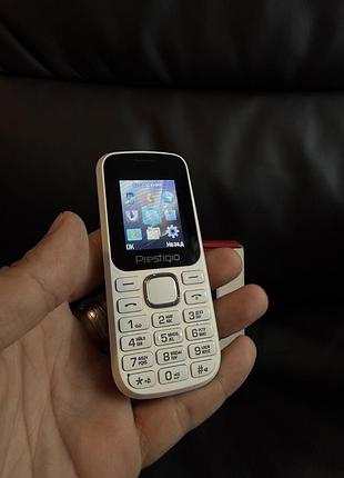 Кнопочний телефон prestigio wize b1.    *4458 3
