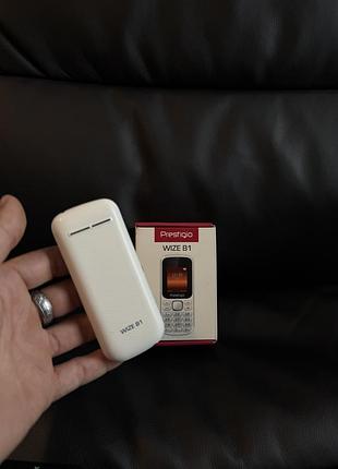 Кнопочний телефон prestigio wize b1.    *4458 4