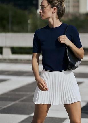 Біла юбка в тенісному стилі zara