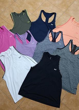 Колекція жіночих тренувальних майок under armour knockout tank різних кольорів.