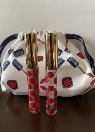 Набор estee lauder из двух блесков и косметички