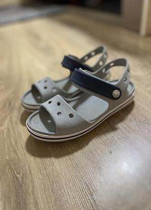 Продам сандалі crocs 7