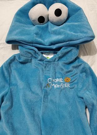 Дітячіі комбинезон-кигуруми в виде коржика (cookie monster) из популярного детского шоу [улица сезам] с забавными объемными глазами на капюшоне.