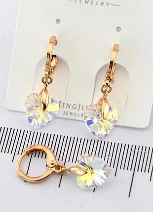 Сережки xр. позолота 18к. камені: swarovski білий хамелеон. довжина: 27 мм. ширина: 10 мм.