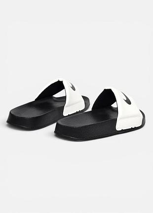 Nike slide
• white black • 6