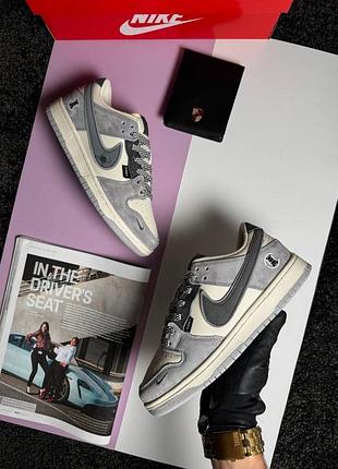 Жіночі кросівки nike sb dunk low x kaws grey beige