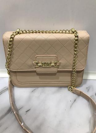 Жіноча бежева сумочка michael kors