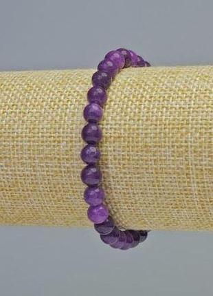 Браслет сугилит гладкий шарик d-6мм+- (стрейч) l-18см+- новинка