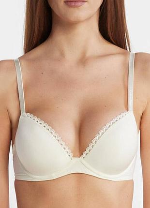 Бюстгальтер женский calvin klein 80a с пуш-ап цвет айвори шампань