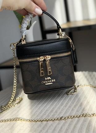 Сумочка бочонок coach коричнева на цепочці
