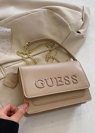 Жіноча сумка guess крос-боді на ланцюжку бежева