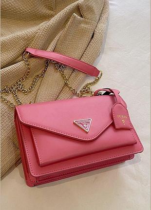 Жіноча сумка guess 18091 крос-боді рожева