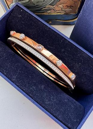 Жорсткий жіночий браслет swarovski з колекції thrilling (артикул: 5555746) бу оригінал