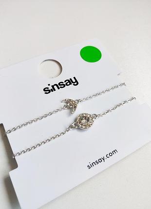 Комплект сріблястих браслетів sinsay
