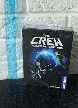 Настольная игра the crew: the quest for planet nine (экипаж: поиски девятой планеты) упакована
