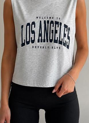 Стильна футболка zara світло-сірого меланжевого кольору з написом los angeles.