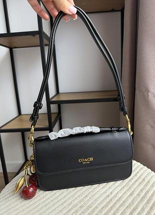 Чорна сумочка з натуральної шкіри coach