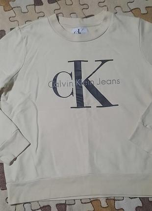 Оригинальный свитшот calvin klein jeans женский цвет кунжут / бежевый оверсайз кроп