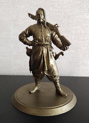 Декоративная фигурка козака с мушкетом