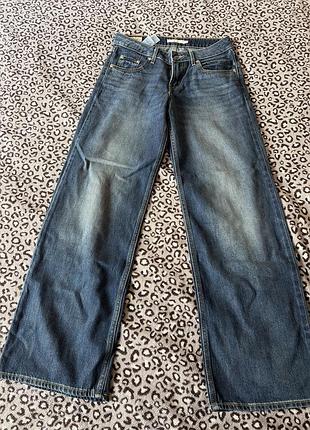 Levi’s жіночі джинси на блискавці з ґудзиком сині малий ефект потертості низька посадка широкі