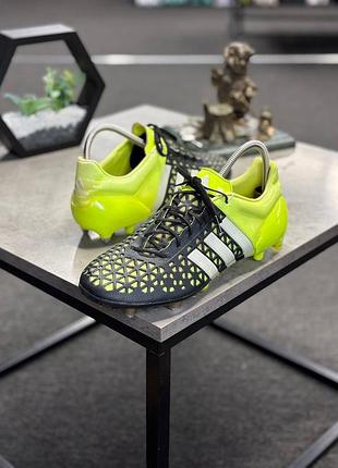 Футбольні бутси adidas ace 15.1 fg/ag чорного та жовтого кольорів.