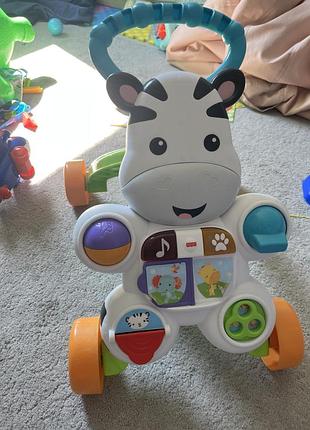 Дитяча каталка fisher price