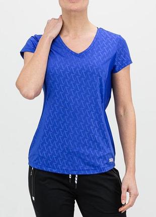 Жіноча спортивна футболка sjeng sports agnella women's tennis shirt яскраво-синього кольору.