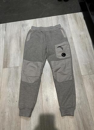 Штани cp company