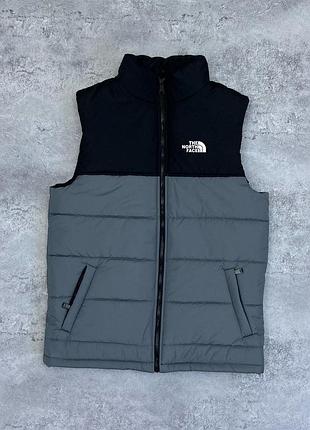Жилетка the north face чорно-сірий