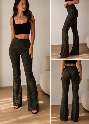 Нові блискучі штани-кльош monki tora lurex trousers чорні із золотим люрексом xs