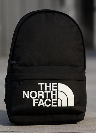 Легкий качественный универсальный рюкзак the north face для повседневного использования черного цвета с передним карманом