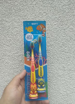 Набір дитячих зубних щіток dentalux kids soft 0-6 років 2 шт | м'які щетинки, присоска, німеччина