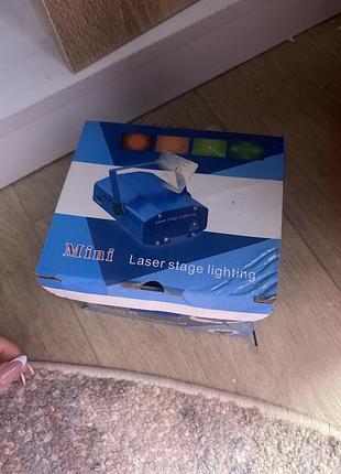 Лазерний мініпроєктор mini laser stage lighting світломузика майже новий