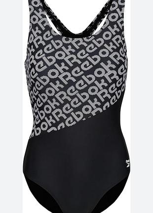 Брендовый слитный спортивный купальник от reebok в черно-белом дизайне.