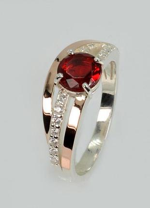 Серебряное кольцо с золотыми вставками