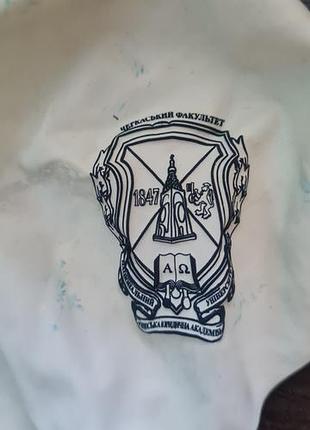Спущена пробита повітряна куля з друкованим логотипом ну,,оюа"