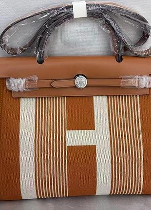 Шикарна шкіряна сумка люкс з текстилем руда, коричнева herbag 31